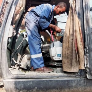 fuel monitoring installation team of walta technologies installing fuel sensor on excavator