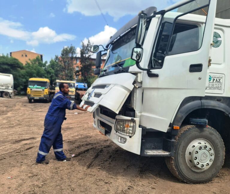 fuel monitoring technicans preparing a truck for fuel sensor installation