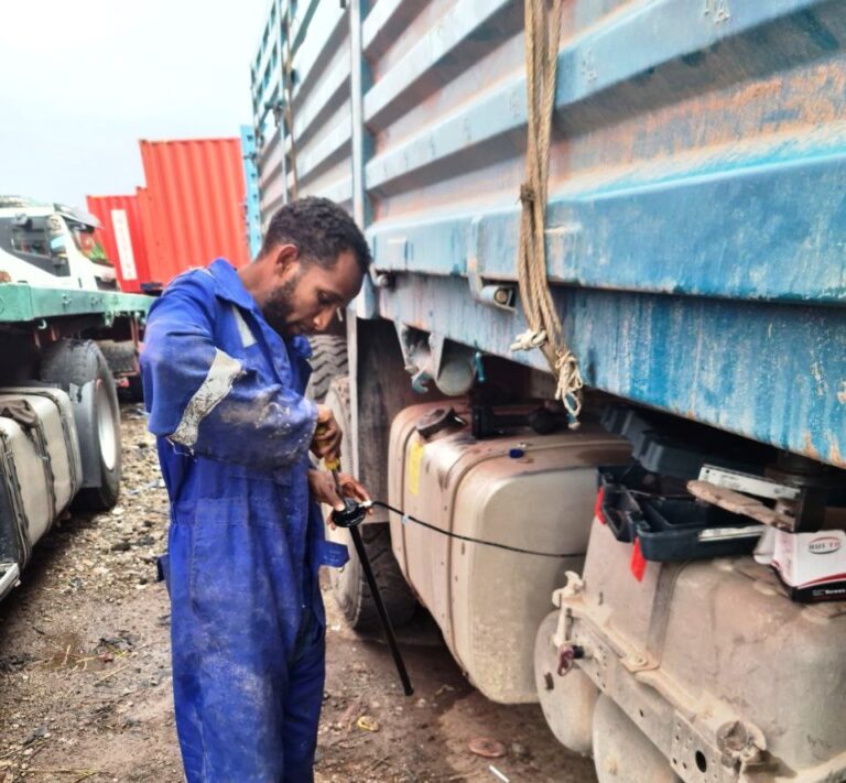 our fuel monitoring technicians calibrating fuel sensor for installation walta technologies