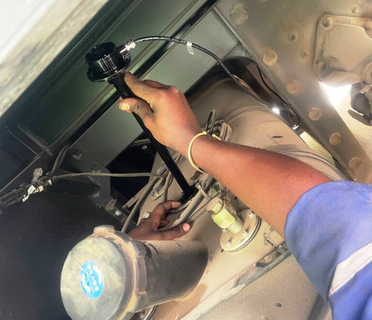 soloda bus our fuel monitoring technicans installing capacitive fuel sensor on fuel tank